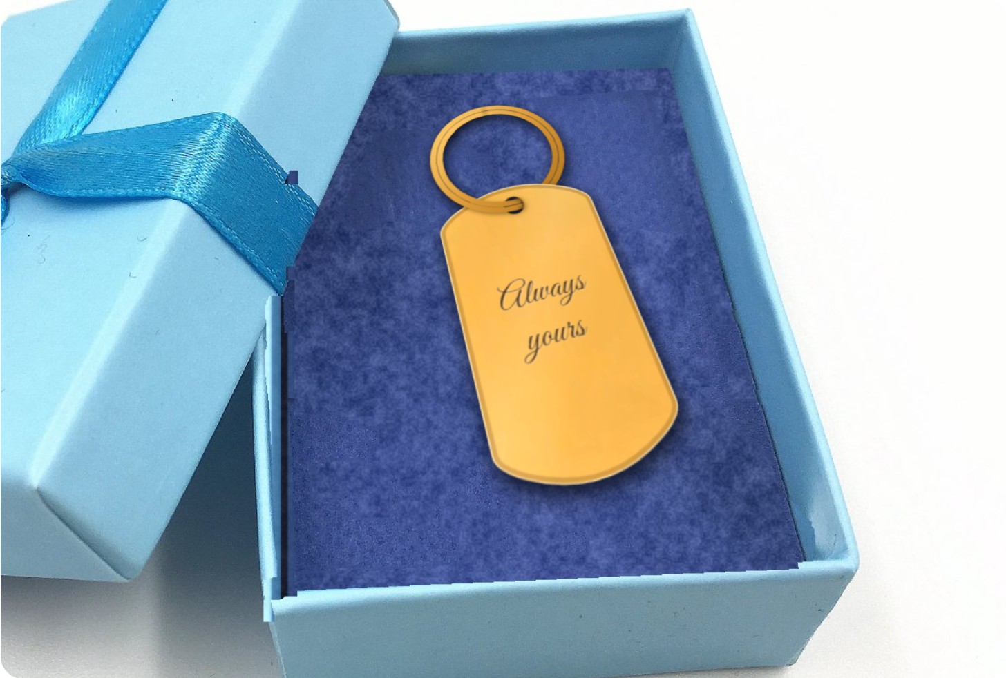 A personalised engraved keychain lying in its gift box