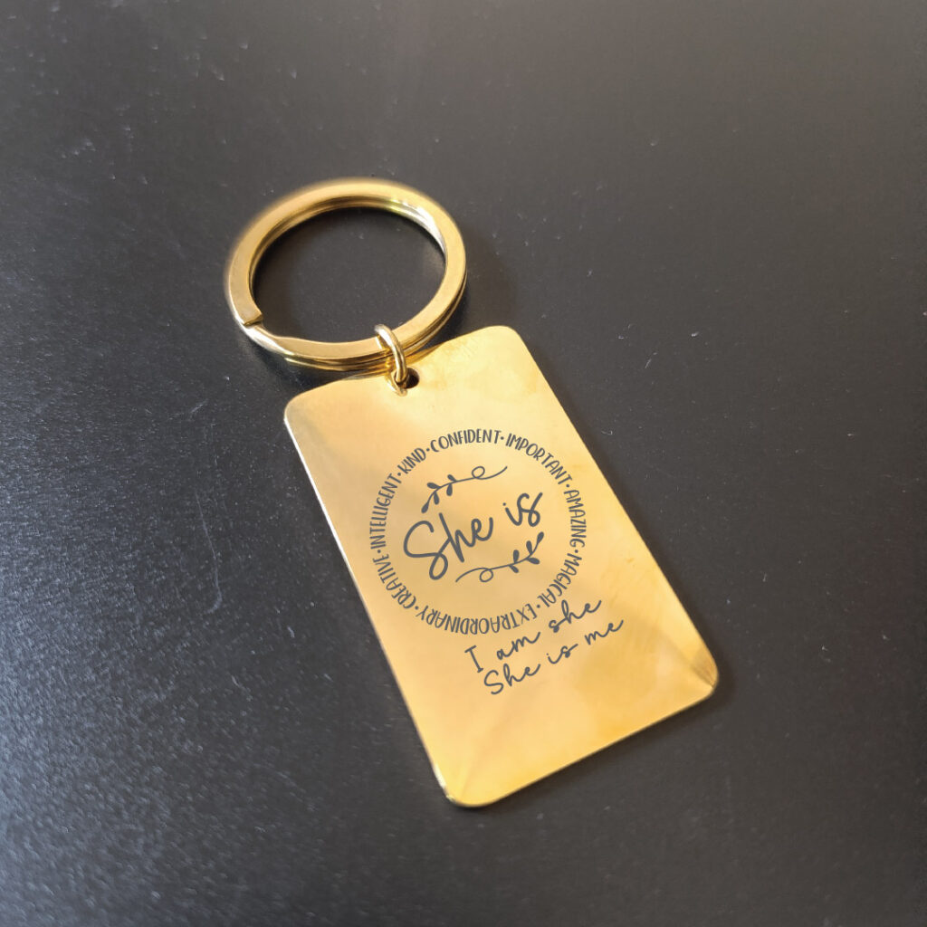 She is confident keychain